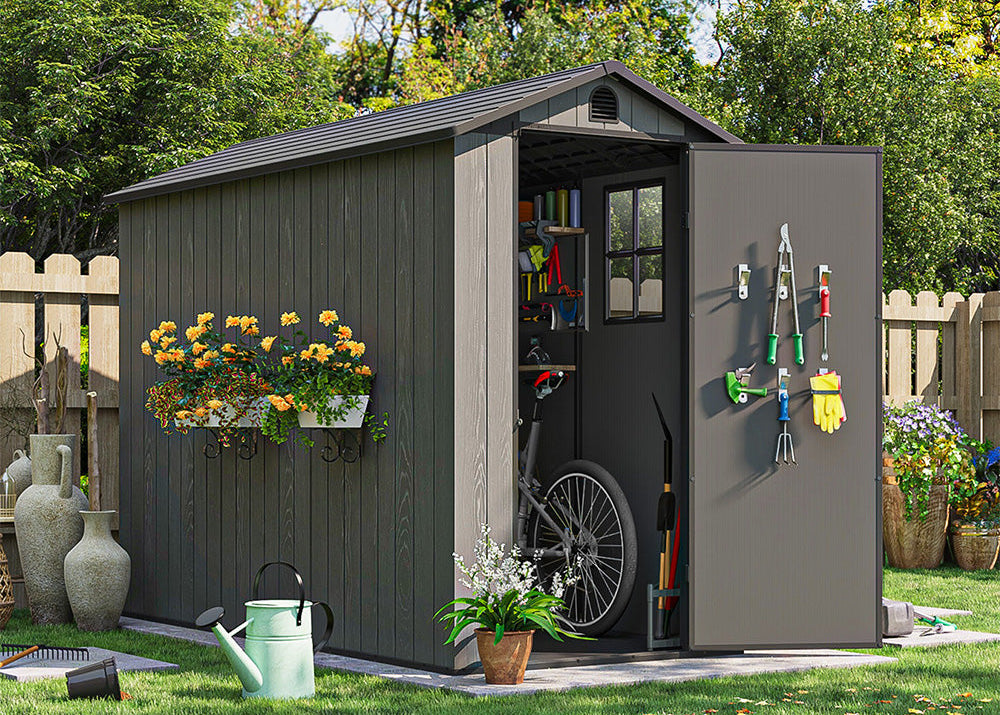4x8 gray garden shed with tools and plants in a backyard setting